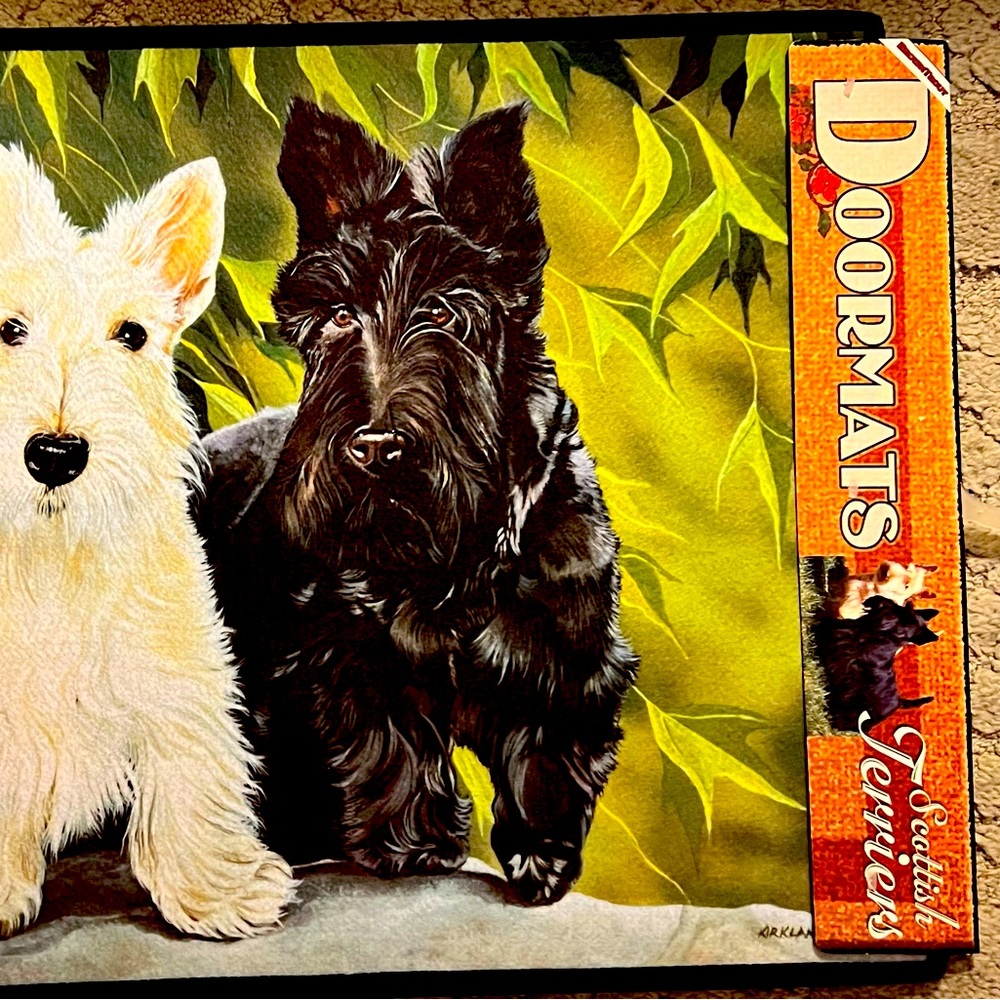 Doormat featuring Scottish terriers.